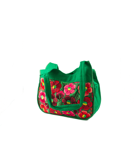 Deze groene tas met geborduurde bloemen is van fair fashion merk Bohemian Fair Trade en eerlijk gemaakt in Guatemala.